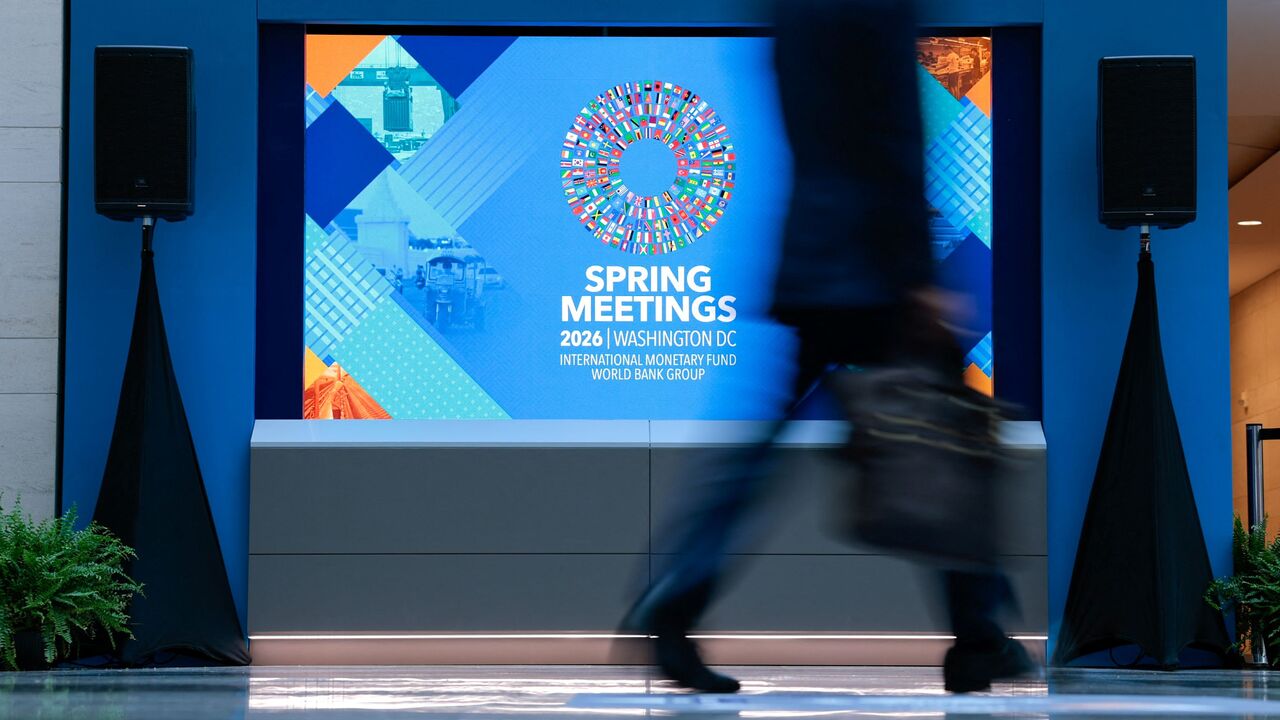 A man walks through the atrium during the 2026 IMF and World Bank Group Spring Meetings in Washington, DC, on April 14, 2026. (Photo by Kent NISHIMURA / AFP via Getty Images)