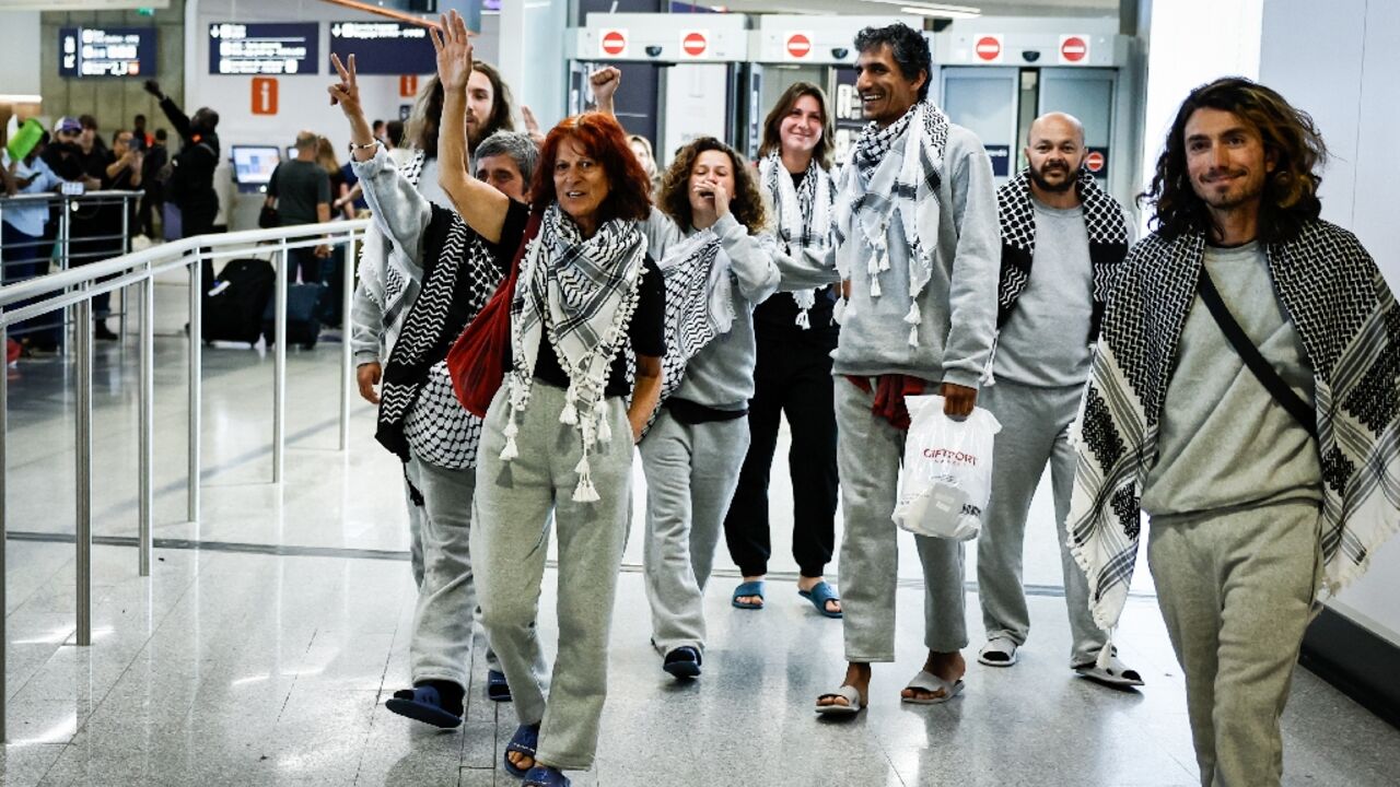 Eight French nationals arrived at Charles de Gaulle airport near Paris on Friday afternoon