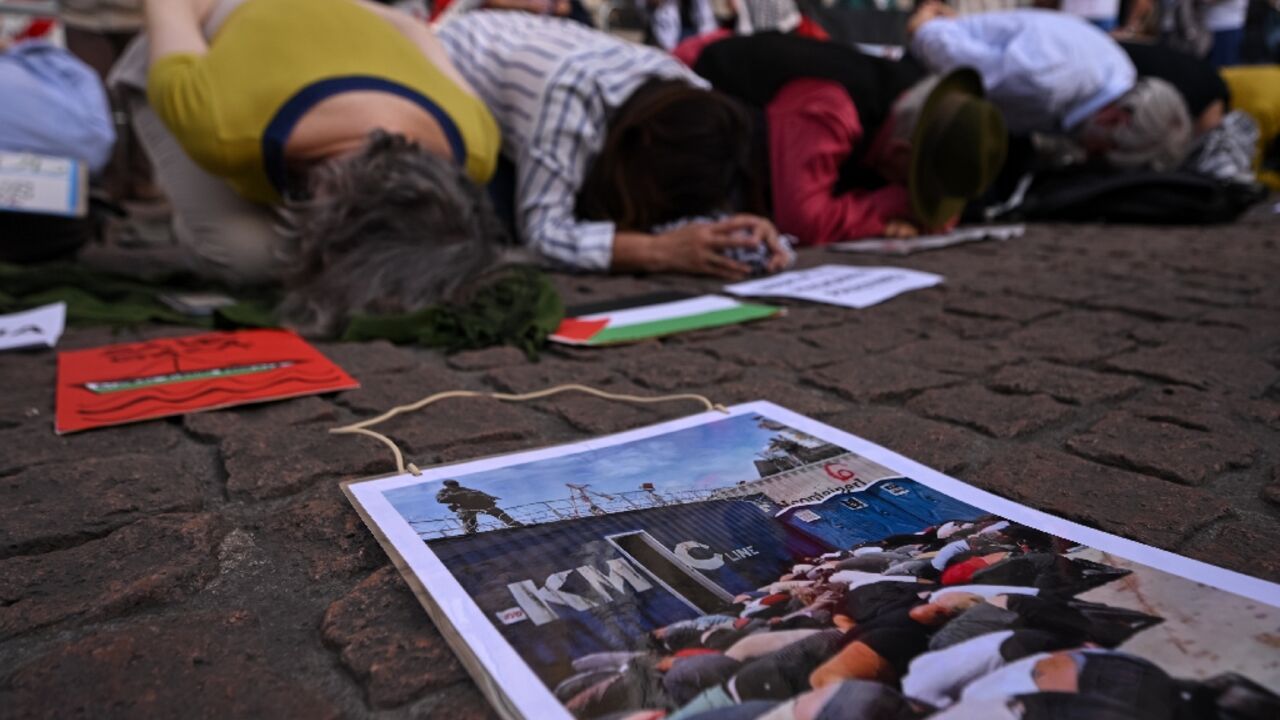 Protesters in Italy re-enacted Israel's detention and alleged abuse of activists in the Global Sumud Flotilla, amid growing global outrage