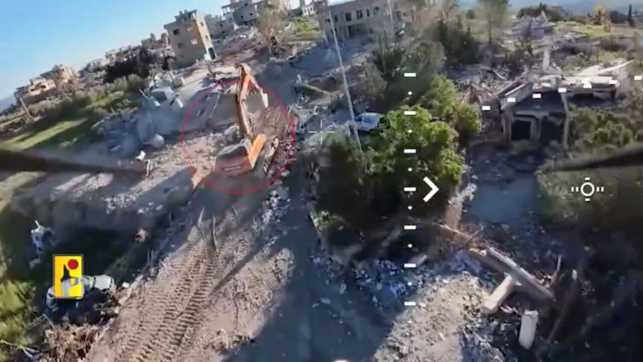 A screengrab taken from a video released by Hezbollah says to show an Israeli engineering unit moments before being hit by an FPV drone attack, in Rashaf, Lebanon, with the date of the video given as April 23, 2026.  HEZBOLLAH MILITARY MEDIA/Handout via REUTERS
