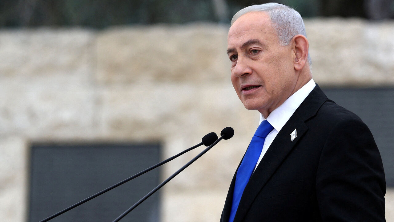 FILE PHOTO: Israel’s Prime Minister Benjamin Netanyahu speaks during a ceremony commemorating Israel’s Remembrance Day for fallen soldiers, or Yom HaZikaron, at the Military Cemetery on Mount Herzl in Jerusalem April 21, 2026. ILIA YEFIMOVICH/Pool via REUTERS/File Photo