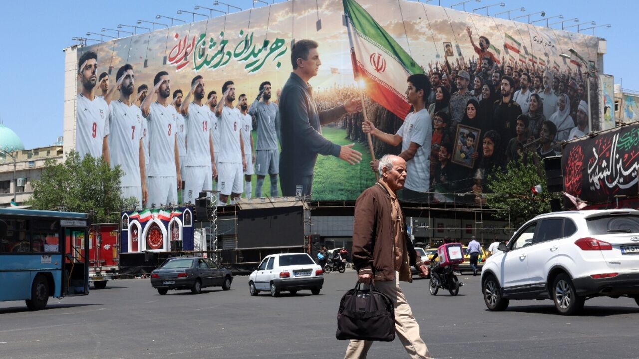 Tehran's Enghelab Square, where a huge billboard has been erected in support of Iran's national football team for the 2026 World Cup