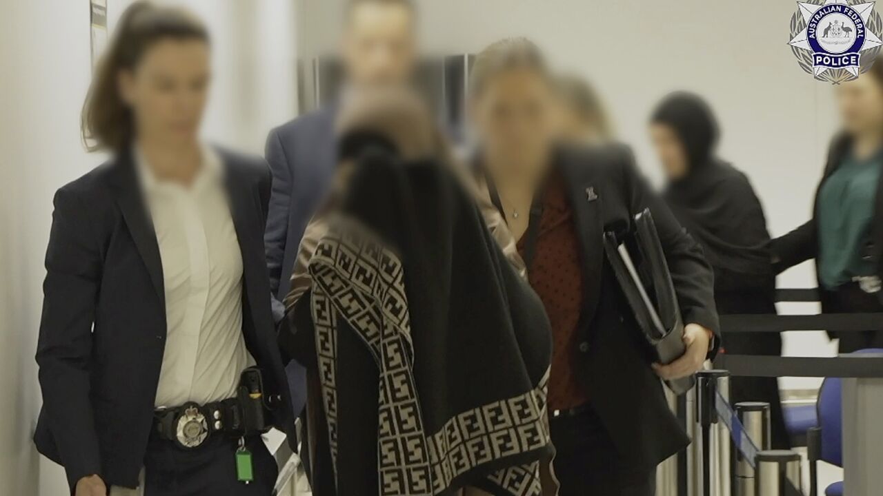 Australian Federal Police officers arrested the mother and daughter as they arrived at Melbourne International airport on Thursday evening. 