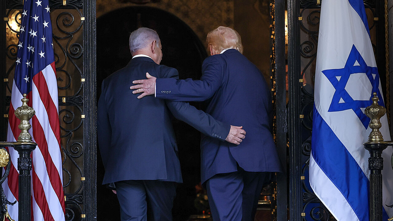 PALM BEACH, FLORIDA - DECEMBER 29: (EDITOR'S NOTE: Alternate crop) U.S. President Donald Trump welcomes Israeli Prime Minister Benjamin Netanyahu to his Mar-a-Lago club on December 29, 2025 in Palm Beach, Florida. The two leaders are scheduled to hold a bilateral meeting to discuss regional security in the Middle East as well as the U.S.-Israel partnership. (Photo by Joe Raedle/Getty Images)