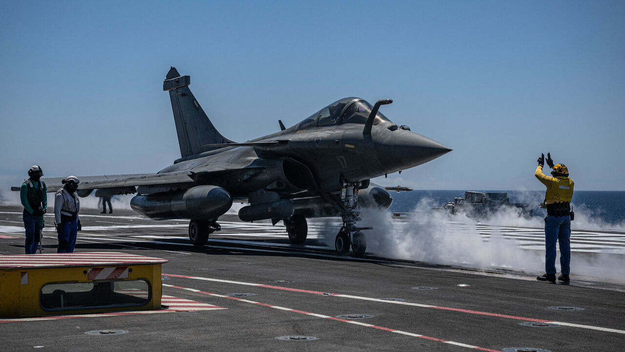 A rafale fighter jet prepares for take off on the deck of the French aircraft carrier Charles de Gaulle during the NATO military exercise Neptune Strike 26-2, off the coast of the Greek island of Crete, on April 27, 2026. 