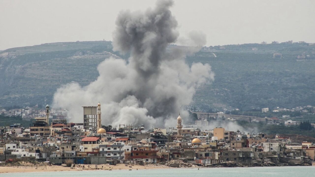 Smoke rises from the site of an Israeli airstrike that targeted Ras Al-Ain in southern Lebanon