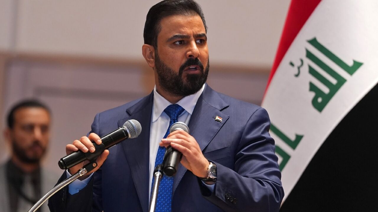 This handout picture released by the Iraqi Prime Minister's Press Office shows new prime minister-designate Ali al-Zaidi speaking ahead of presenting his government to the parliament in Baghdad