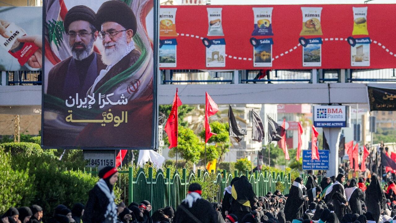A billboard in Beirut depicts slain Ayatollah Ali Khamenei and his son, Mojtaba Khamenei