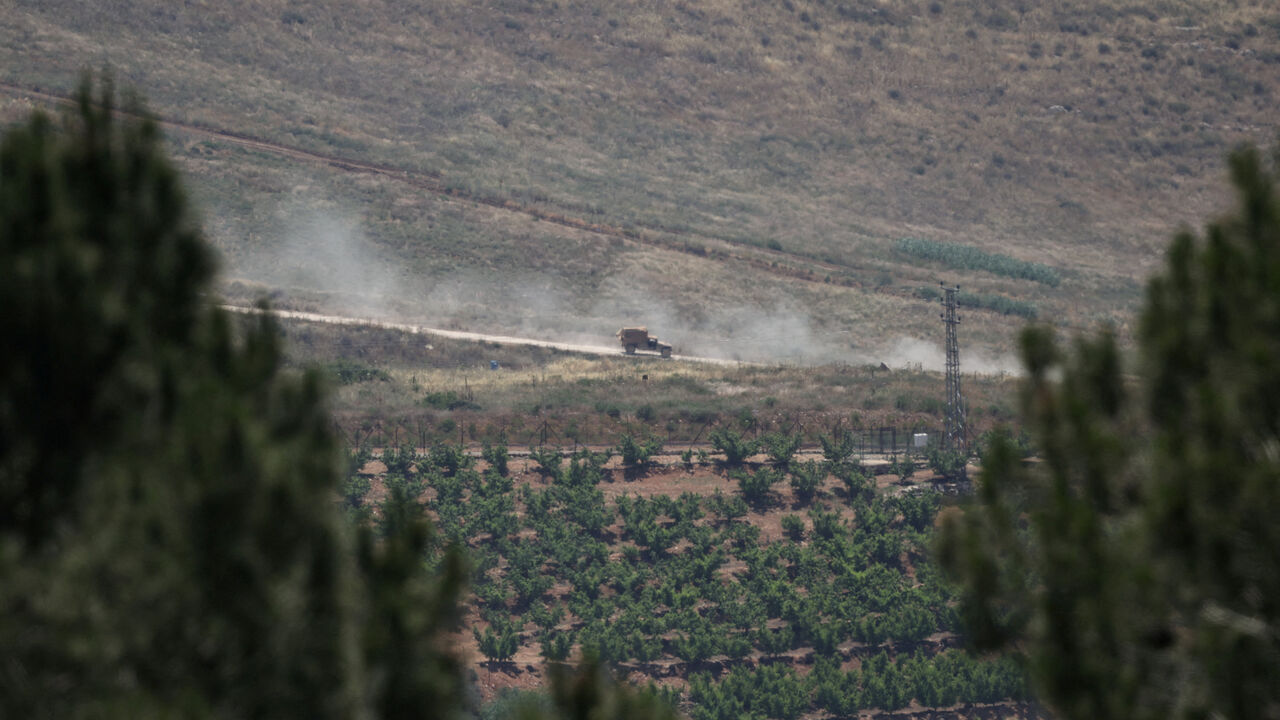 An Israeli military vehicle on a road in southern Lebanon, near the Israel-Lebanon border, as seen from northern Israel, June 2, 2026. REUTERS/Shir Torem     TPX IMAGES OF THE DAY