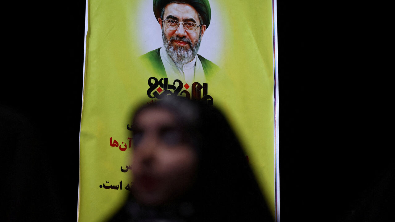 A banner with a picture of Iran’s new Supreme Leader, Mojtaba Khamenei, during a rally in Tehran, Iran, May 6, 2026. Majid Asgaripour/WANA (West Asia News Agency) via REUTERS ATTENTION EDITORS - THIS PICTURE WAS PROVIDED BY A THIRD PARTY      TPX IMAGES OF THE DAY
