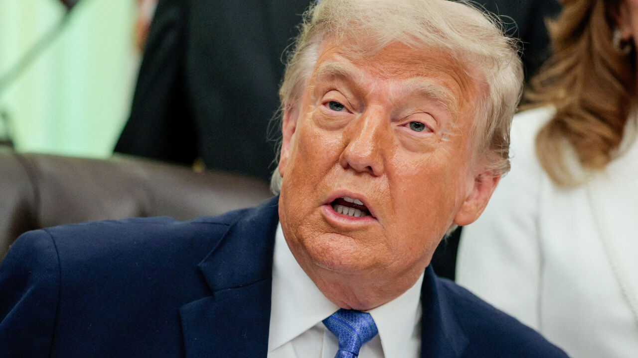 FILE PHOTO: U.S. President Donald Trump speaks in the Oval Office as he signs the Secure America Act, at the White House in Washington, D.C., U.S., June 10, 2026. REUTERS/Evan Vucci/File Photo
