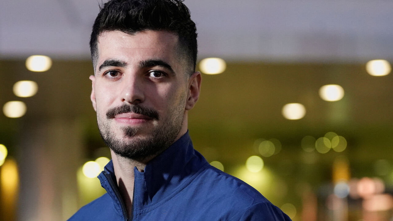 Iran player Saeid Ezzatollahi poses for a photo during an interview with Reuters after 15 Iranian soccer federation members denied visas to travel to the U.S. for the World Cup games, at a hotel in Tijuana, Mexico, June 11, 2026. REUTERS/Aimee Melo