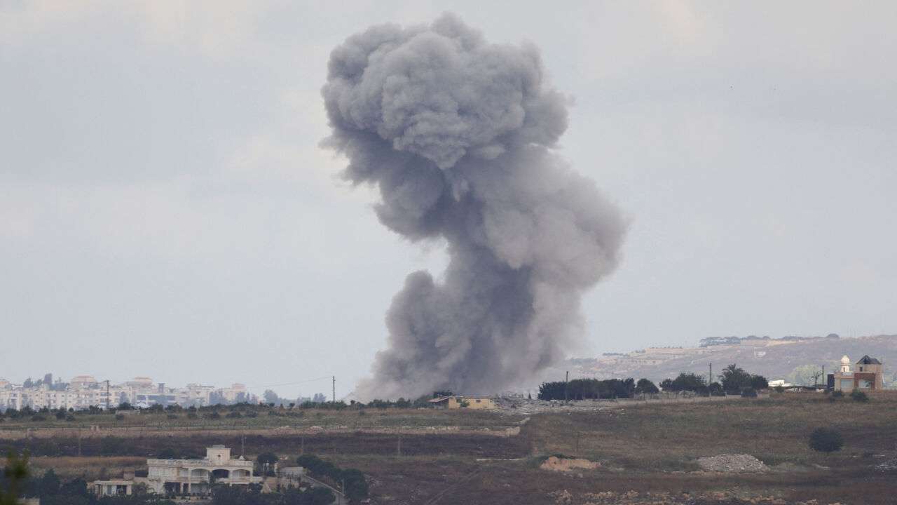 Smoke billows from southern Lebanon following an Israeli strike, as seen from Marjayoun, Lebanon, June 14, 2026. REUTERS/Stringer