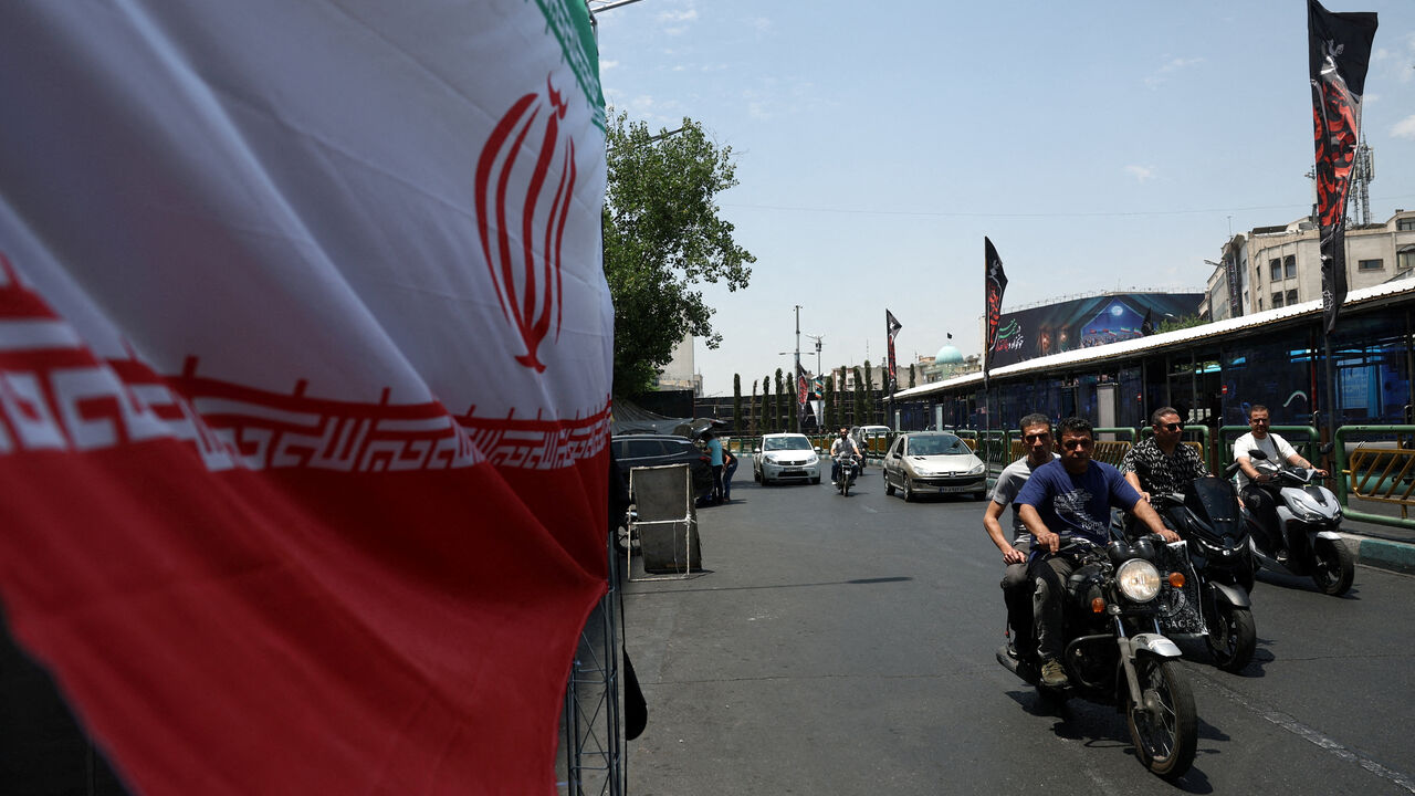 People drive on a street in Tehran, Iran, June 18, 2026. Majid Asgaripour/WANA (West Asia News Agency) via REUTERS