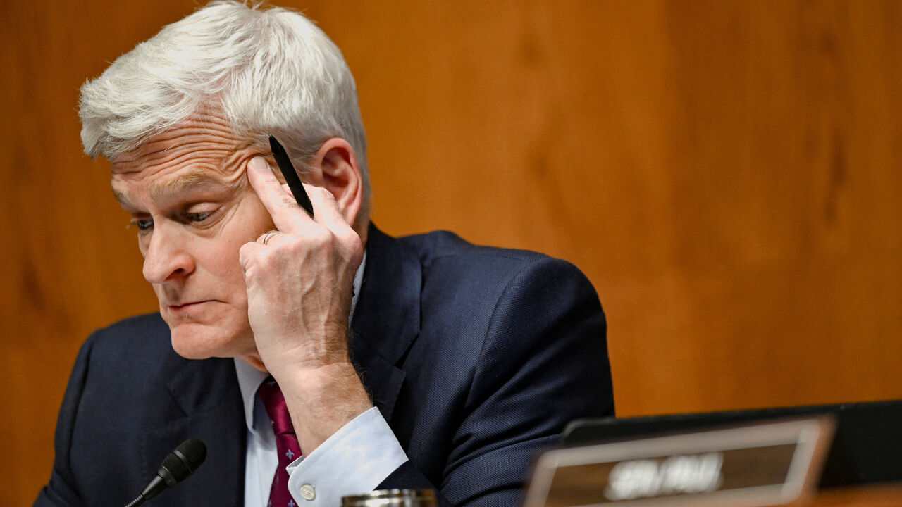 U.S. Senator Bill Cassidy (R-LA) reacts as U.S. Health and Human Services (HHS) Secretary Robert F. Kennedy Jr. testifies before a Senate Health, Education, Labor, and Pensions Committee hearing on U.S. President Donald Trump's budget request for the Department of Health and Human Services on Capitol Hill in Washington, D.C., U.S., April 22, 2026. REUTERS/Annabelle Gordon
