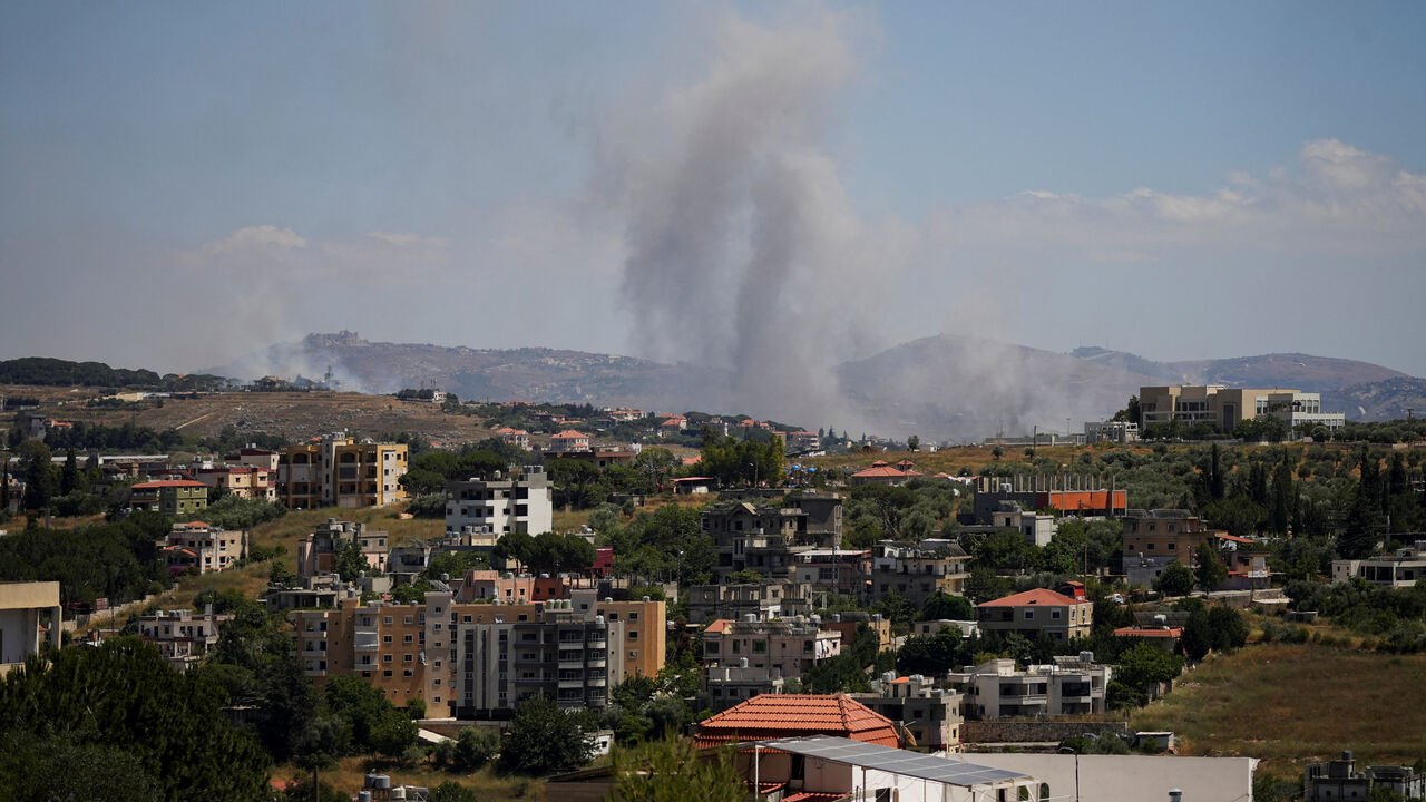 Smoke billows from southern Lebanon following an Israeli strike, as seen from Kfartibnit, Lebanon, June 19, 2026. REUTERS/Stringer