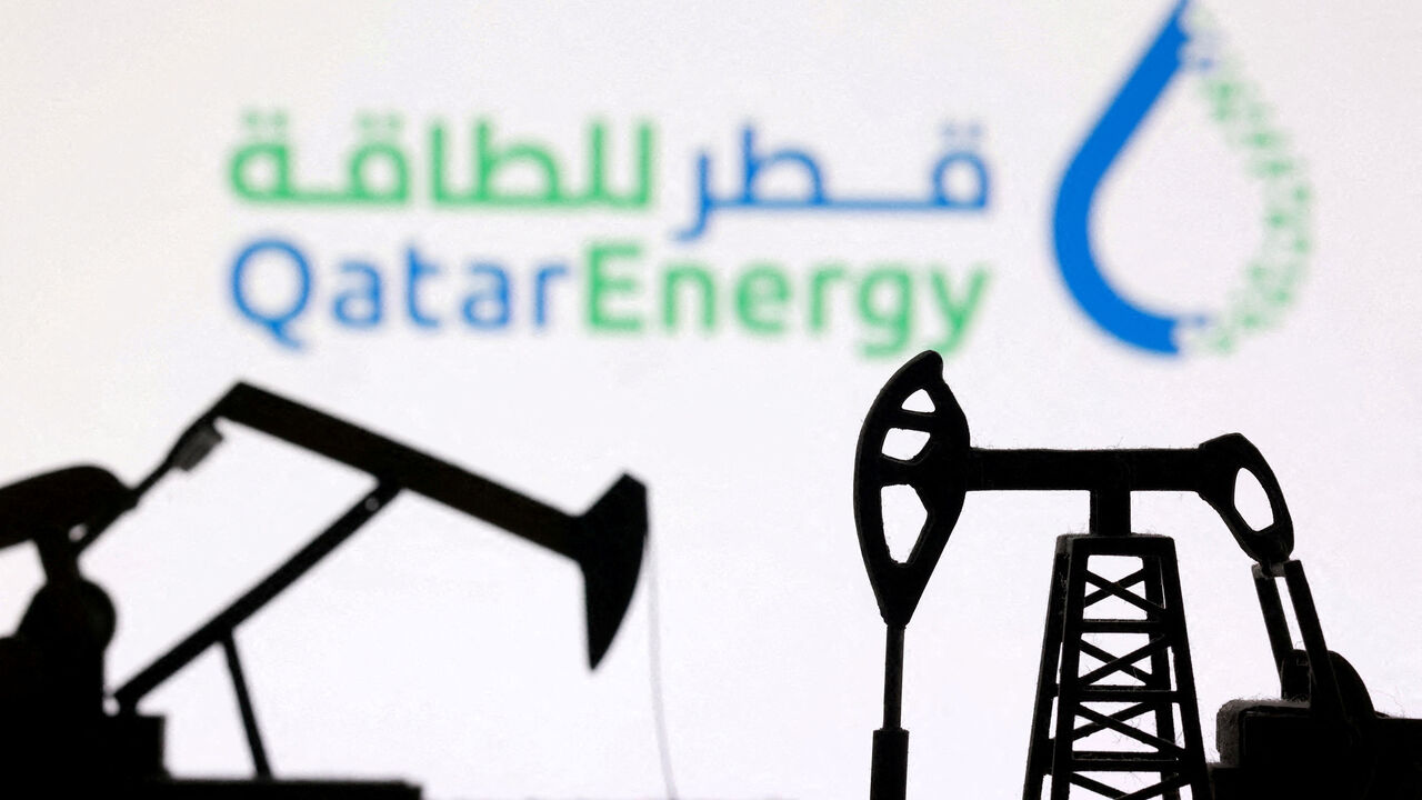 FILE PHOTO: 3D-printed oil pump jacks and the QatarEnergy logo appear in this illustration created on March 2, 2026. REUTERS/Dado Ruvic/Illustration/File Photo/File Photo