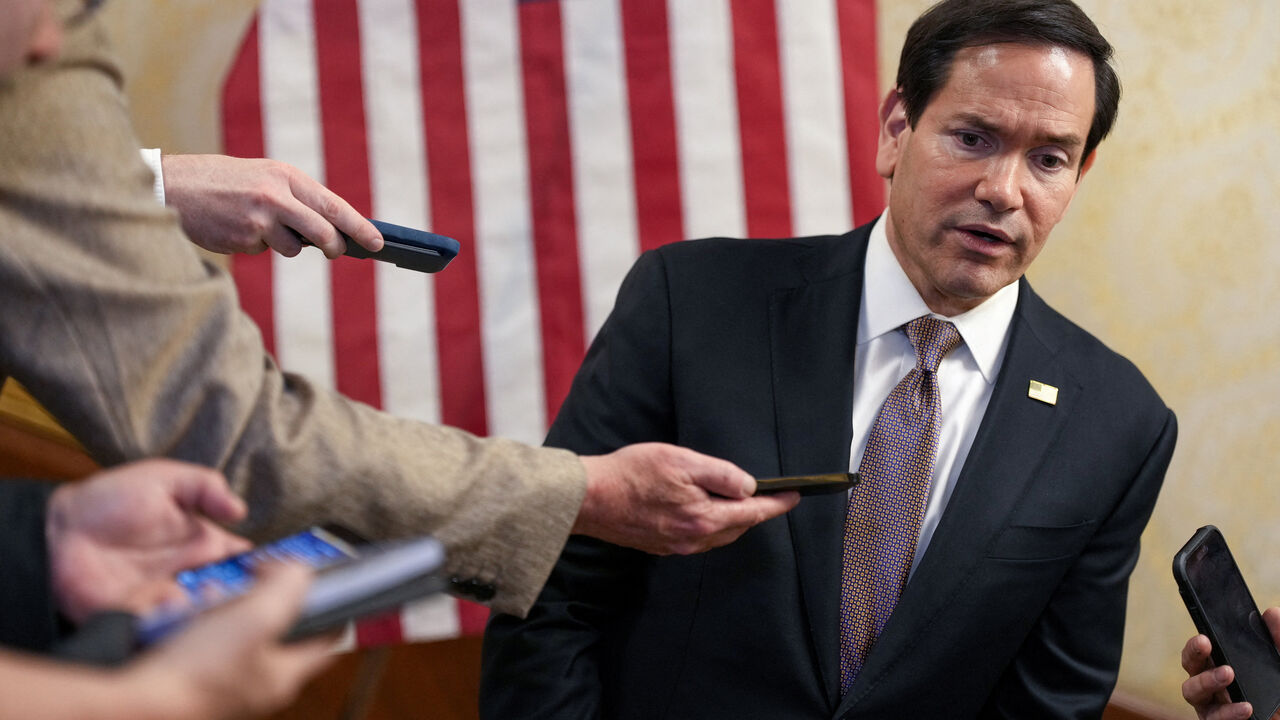 U.S. Secretary of State Marco Rubio speaks to members of the media before boarding a U.S. Air Force C-17 Globemaster III transport aircraft en route to Bahrain at Kuwait International Airport during his visit to the Middle East to discuss the interim deal between the U.S. and Iran with Arab Gulf allies, in Kuwait City, Kuwait, June 24, 2026. REUTERS/Eric Lee/Pool