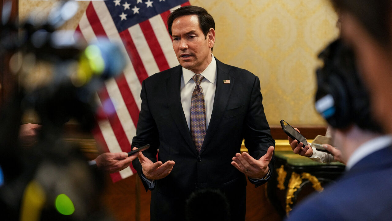 U.S. Secretary of State Marco Rubio speaks to members of the media before boarding a U.S. Air Force C-17 Globemaster III transport aircraft en route to Bahrain during his visit to the Middle East to discuss the interim deal between the U.S. and Iran with Arab Gulf allies, at Kuwait International Airport, June 24, 2026. REUTERS/Eric Lee/Pool
