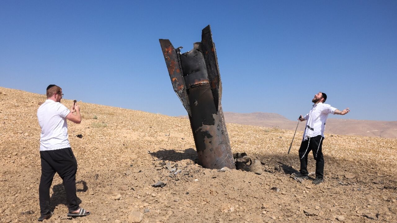 Iran fired some 30 missiles at Israel, some landing in the occupied territories