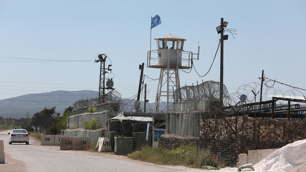 A car drives past an United Nations Disengagement Observer Force (UNDOF) outpost in the village of Khan Arnabah, Quneitra, southern Syria, April 29, 2026.
