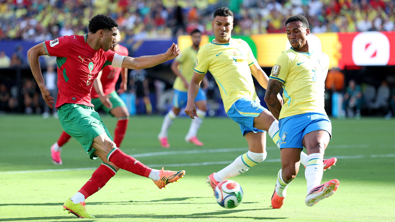Achraf Hakimi #2 of Morocco shoots and misses a chance against Gabriel Magalhaes #3 of Brazil during the FIFA World Cup 2026 Group C match between Brazil and Morocco at New York New Jersey Stadium on June 13, 2026 in East Rutherford, New Jersey.