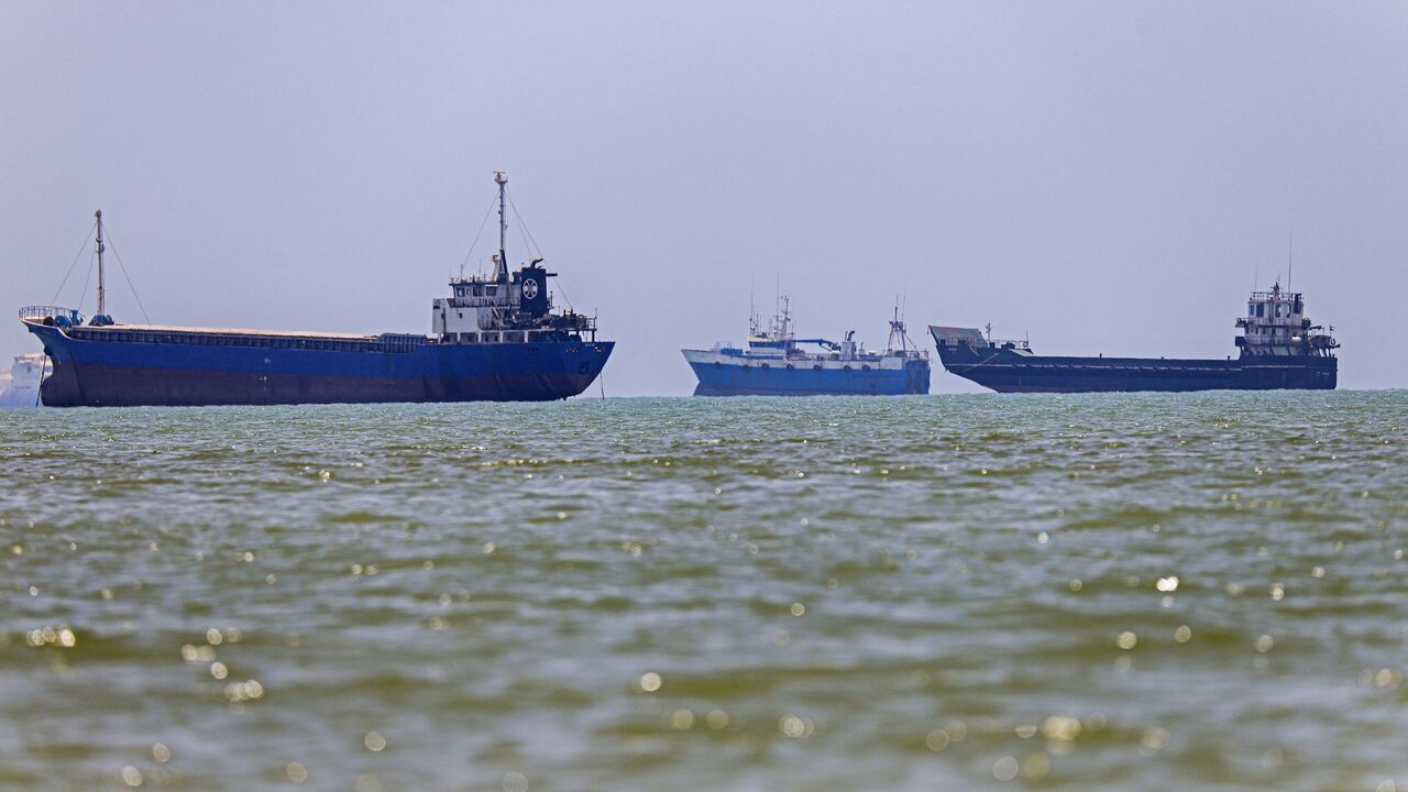 In this picture obtained from Iran's ISNA news agency on June 18, 2026, vessels are seen anchored in Bandar Abbas along the Strait of Hormuz. 