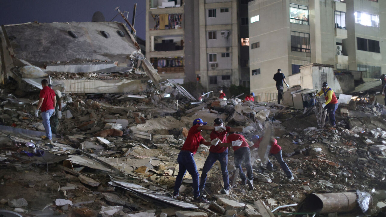 Responders arrive to a demolished building at San Bernardino after a magnitude 7.2 earthquake struck Venezuela and other regions in the Caribbean on June 24, 2026 in Caracas, Venezuela.