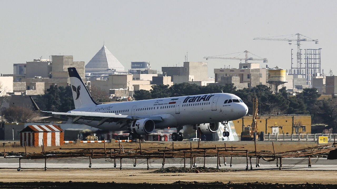 An Airbus A321 airliner arrives at the Mehrabad international airport during the delivery of the first batch of planes to the Iranian state airline Iran Air in the capital Tehran on Jaunary 12, 2017. - The aircraft arrived as part of an order for 100 other Airbus planes with a list price of around $20 billion (19 billion euros) on December 22, placed after the lifting of international sanctions on the Islamic republic. It will be used for internal flights landed at Tehran's Mehrabad airport. (Photo by ATTA 