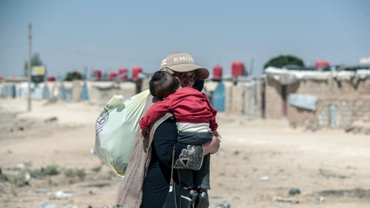 Syrian Kurds displaced from Ras al-Ain complain they can not return to their homes depsite the end of the Syrian war, as Tirkish-backed fighters have moved in