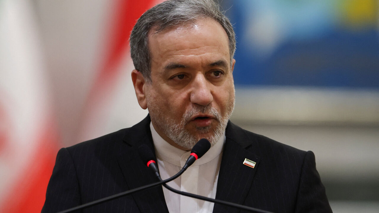Iranian Foreign Minister Abbas Araqchi attends a press conference alongside Iraqi Foreign Minister Fuad Hussein (not pictured), in Baghdad, Iraq, June 28, 2026. REUTERS/Thaier Al-Sudani