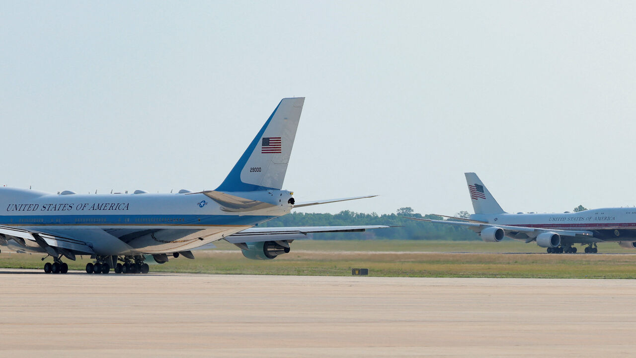 The new Air Force One, a plane gifted by the Qatari government, taxis near the old Air Force One at Joint Base Andrews, Maryland, U.S., July 1, 2026. REUTERS/Kylie Cooper