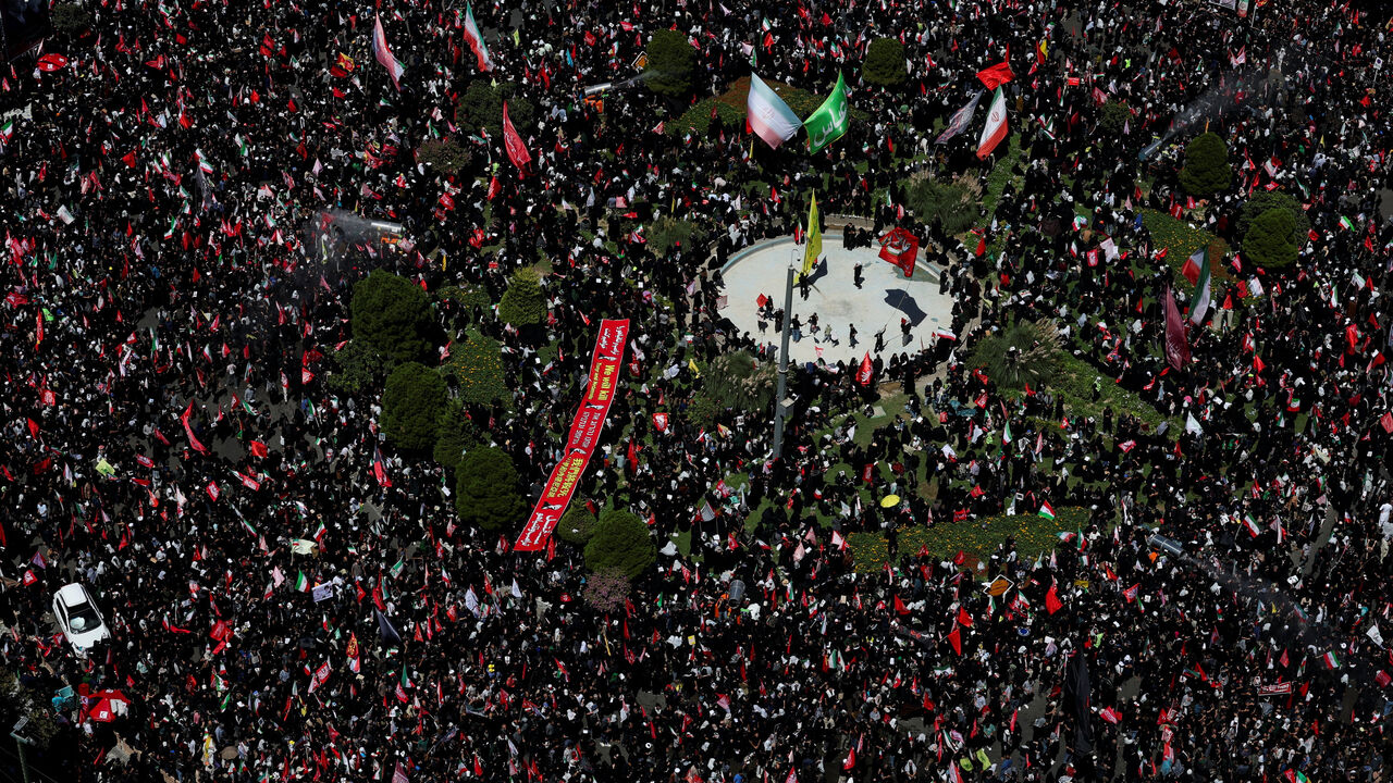 Mourners gather on the day of the burial of Iran's late Supreme Leader Ayatollah Ali Khamenei, who was killed on February 28 in Israeli and U.S. airstrikes, in Mashhad, Iran, July 9, 2026. REUTERS/Mohammed Salem  \