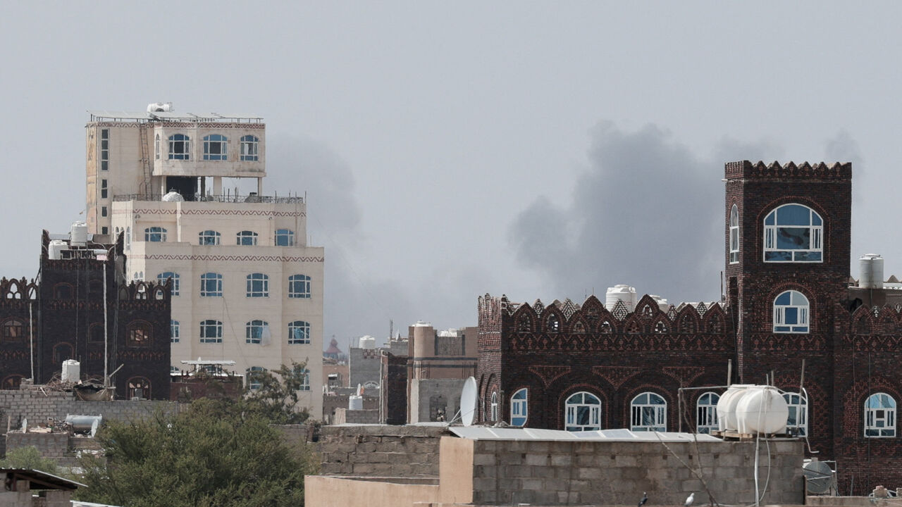 Smoke rises after reports of an airstrike hitting near the Sanaa International Airport, as seen from Sanaa, Yemen, July 13, 2026. REUTERS/Khaled Abdullah