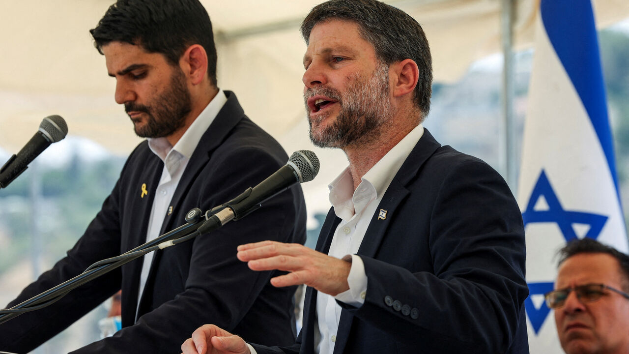FILE PHOTO: Israeli Finance Minister Bezalel Smotrich speaks at a press conference regarding settlements expansion for the long-frozen E1 settlement, that would split East Jerusalem from the occupied West Bank, near the Israeli settlement of Maale Adumim in the Israeli-occupied West Bank, August 14, 2025. REUTERS/Ronen Zvulun/File Photo