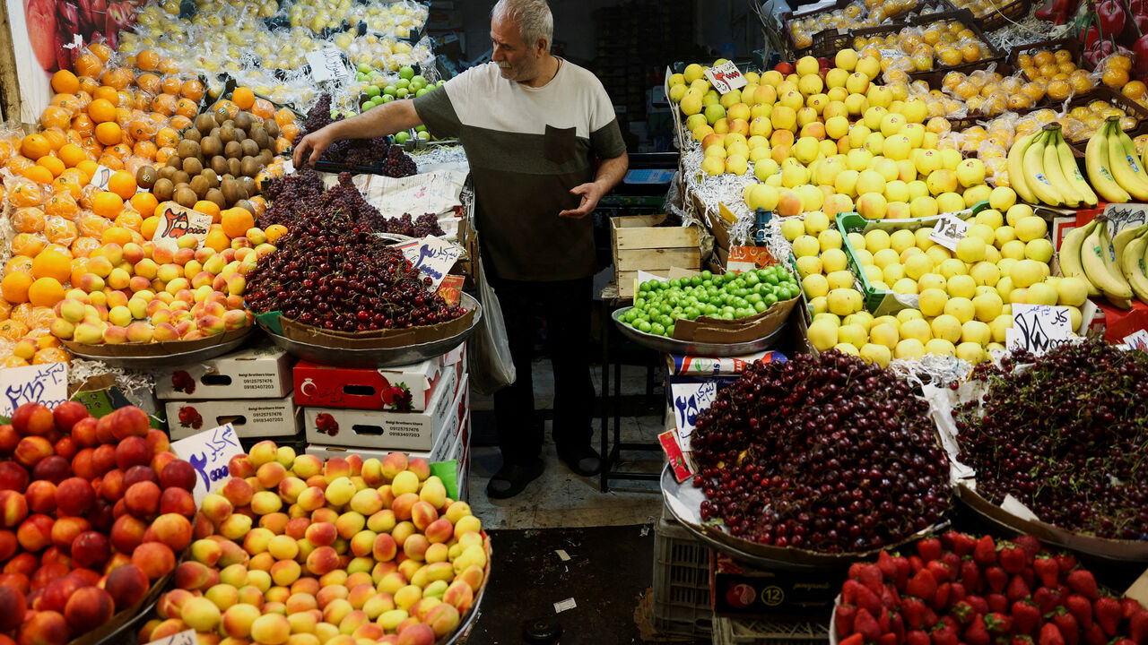 FILE PHOTO: A man works at his store in a local market in Tehran, Iran, June 11, 2026. Majid Asgaripour/WANA (West Asia News Agency) via REUTERS/File Photo