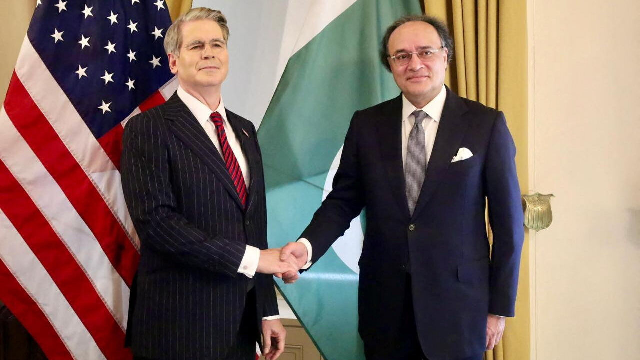 Pakistani Finance Minister Muhammad Aurangzeb and U.S. Treasury Secretary Scott Bessent shake hands as they meet in Washington, D.C., U.S., July 21, 2026. Ministry of Finance/Handout via REUTERS
