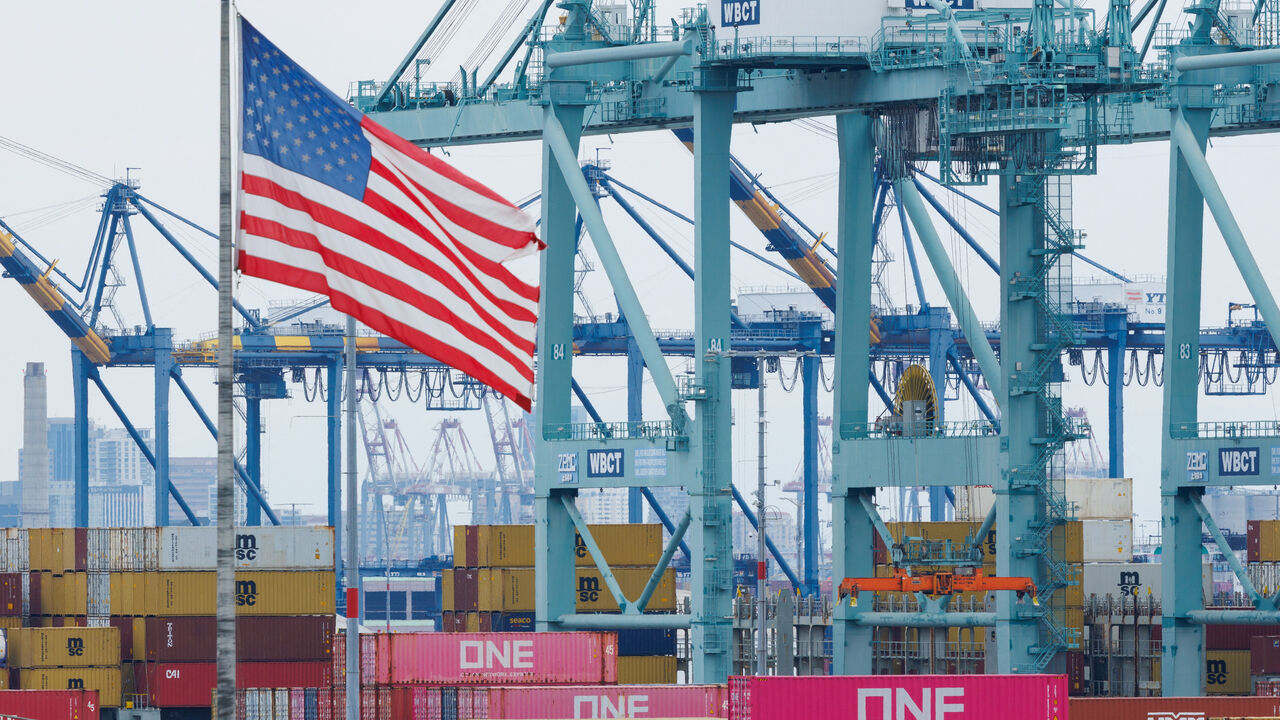 FILE PHOTO: Shipping containers from China sit at the Port of Los Angeles in San Pedro, California, U.S., November 5, 2025. REUTERS/Mike Blake/File Photo