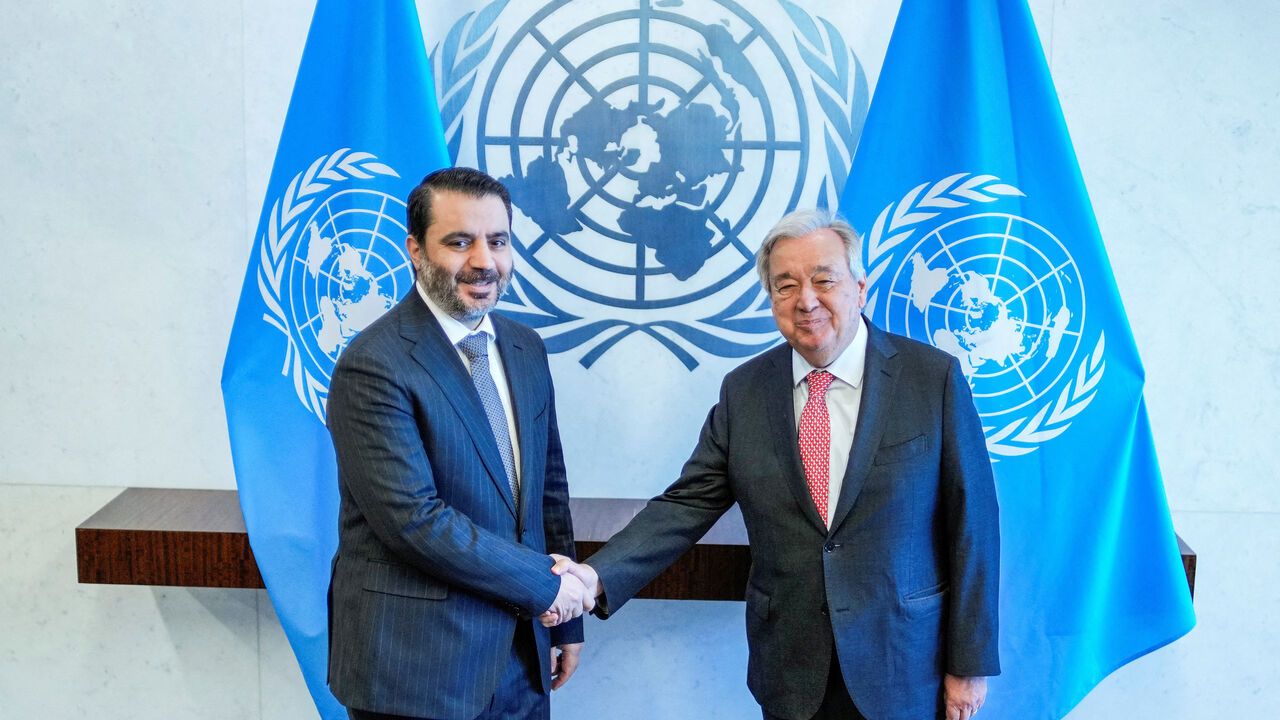 FILE PHOTO: Syrian Foreign Minister Asaad Hassan al-Shaibani shakes hands with United Nations Secretary-General Antonio Guterres at U.N. Headquarters in New York City, U.S., April 28, 2025. REUTERS/Eduardo Munoz/File Photo
