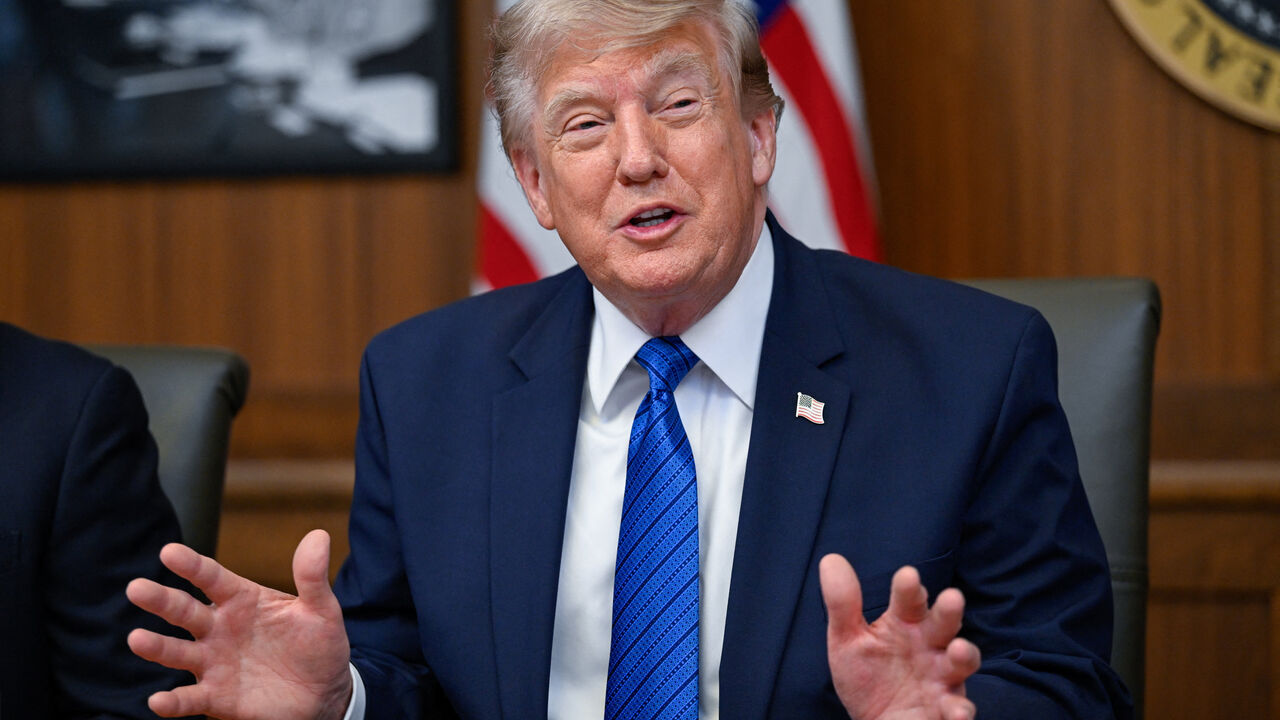 U.S. President Donald Trump gestures as he participates in a cabinet meeting at Camp David in Thurmont, Maryland, U.S., July 31, 2026. REUTERS/Daniel Heuer