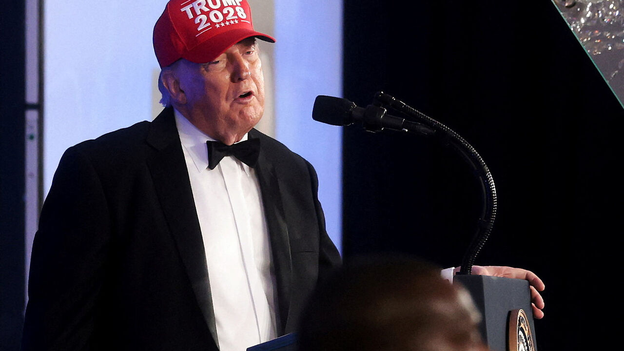 U.S. President Donald Trump wears a "Trump 2028" hat as he delivers remarks at the White House Correspondents' Association (WHCA) Dinner, in Washington, D.C., U.S., July 24, 2026. REUTERS/Jonathan Ernst