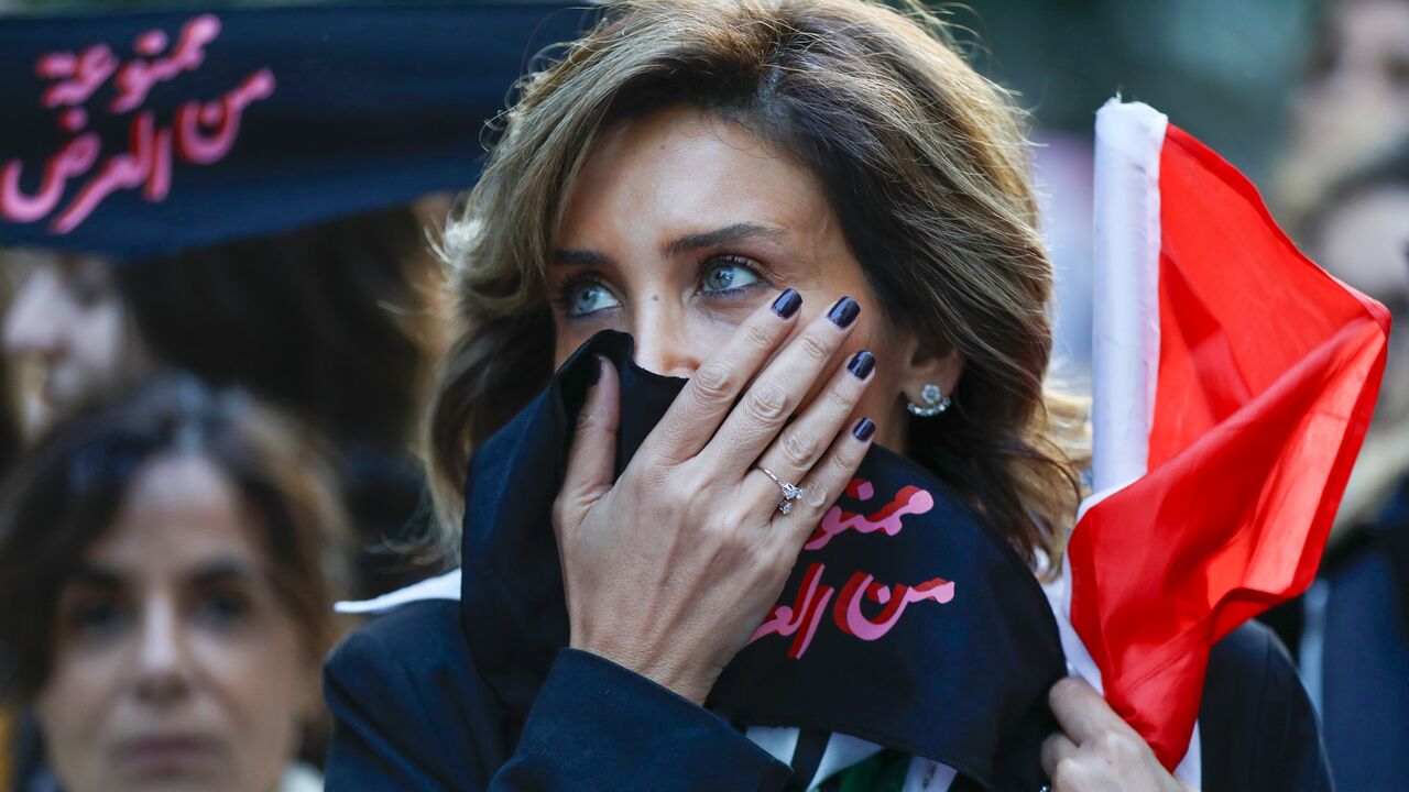 An activist takes part in a demonstration against sexual harassment, rape and domestic violence in the Lebanese capital Beirut on December 7, 2019. (Photo by ANWAR AMRO / AFP) (Photo by ANWAR AMRO/AFP via Getty Images)