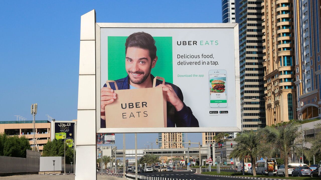Pictured is a billboard advertisement for the food delivery service app Uber Eats in Dubai, United Arab Emirates. — Getty Images
