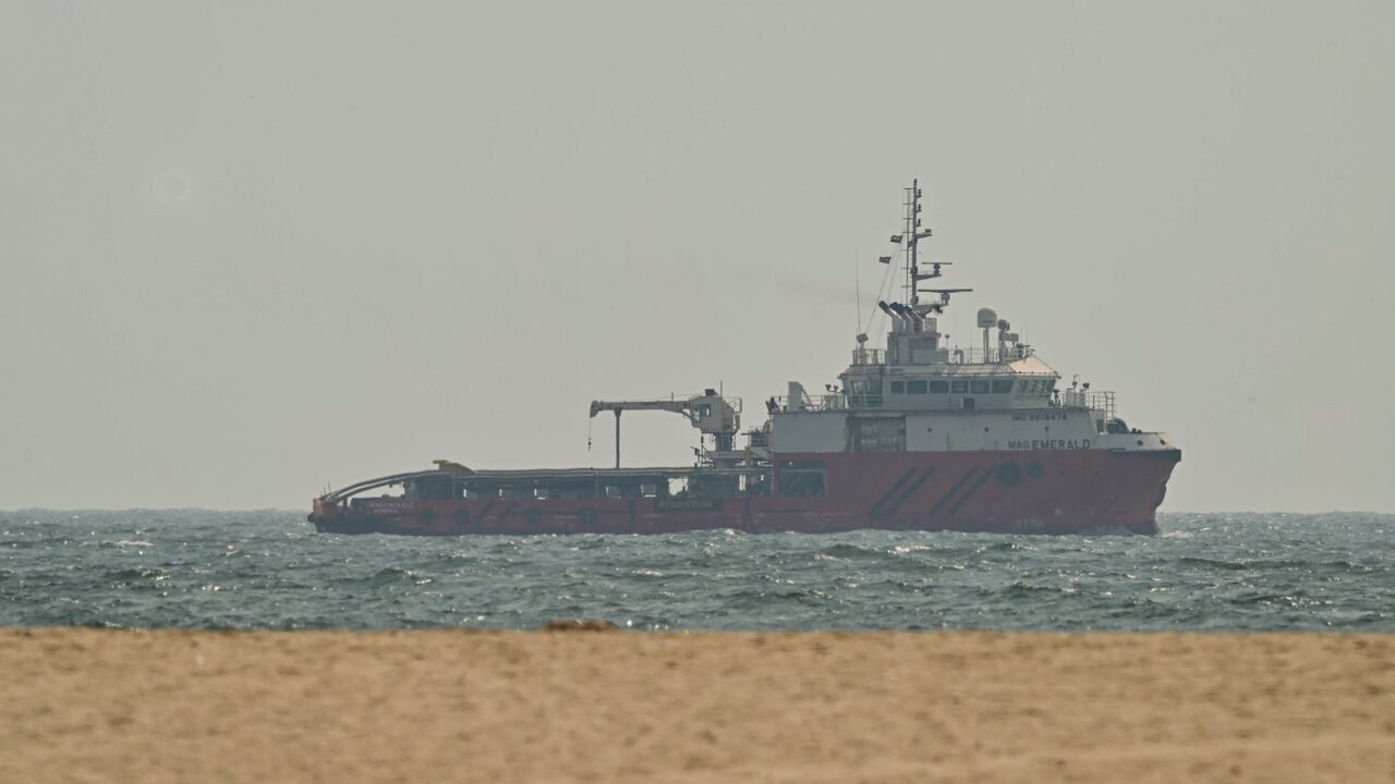A ship sails off the coast of Ajman on July 10, 2026. 