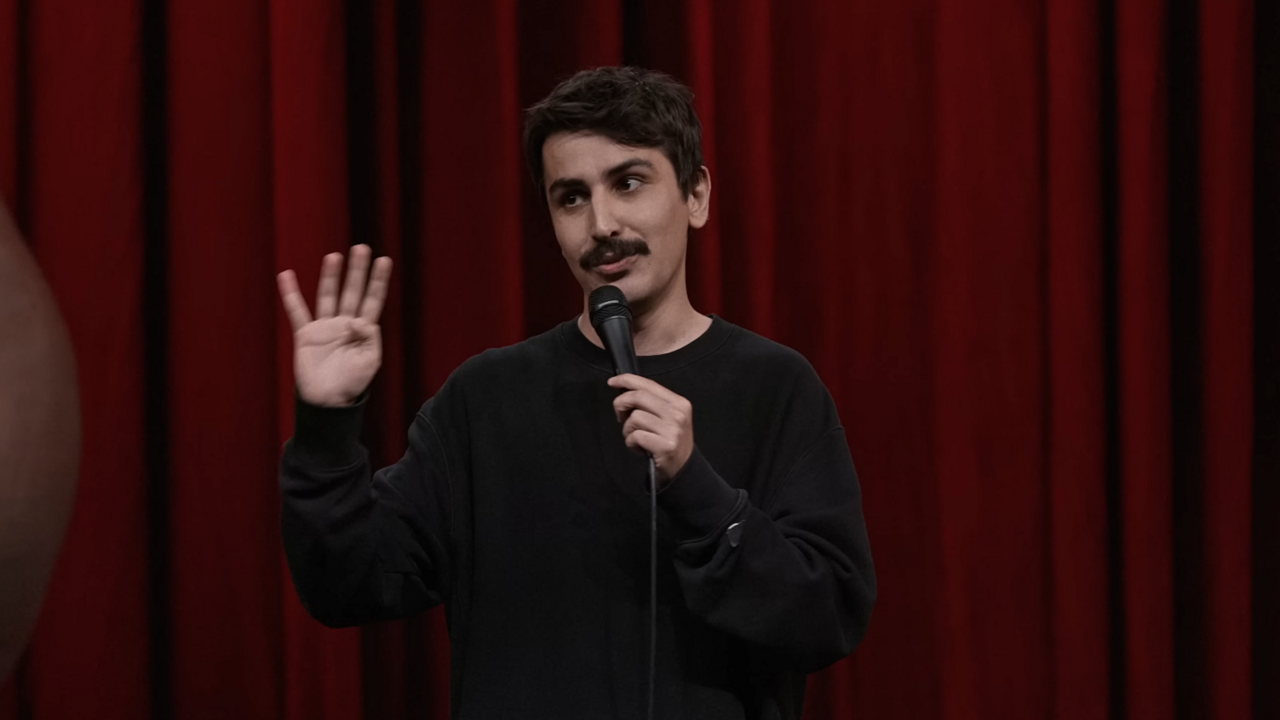 A screenshot of one of Deniz Goktas' standup routines posted to YouTube.