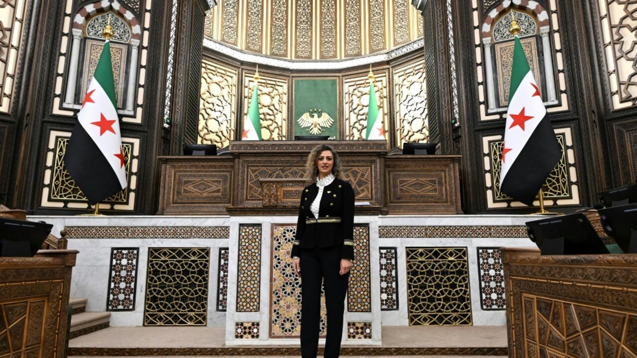Syria's parliament deputy speaker Madonna Beshara poses inside the parliament in Damascus on July 27, 2026