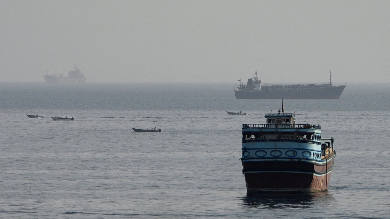 FILE PHOTO: Vessels in the Strait of Hormuz, as seen from Musandam, Oman, August 3, 2026. REUTERS/Stringer/File Photo
