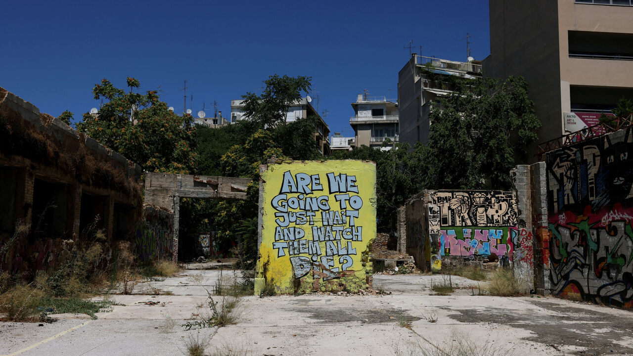 An abandoned building where the body of a British 38-year-old woman, Elisabeth Ross, was found in a suitcase on July 18th, in Athens, Greece, July 31, 2026. REUTERS/Louiza Vradi