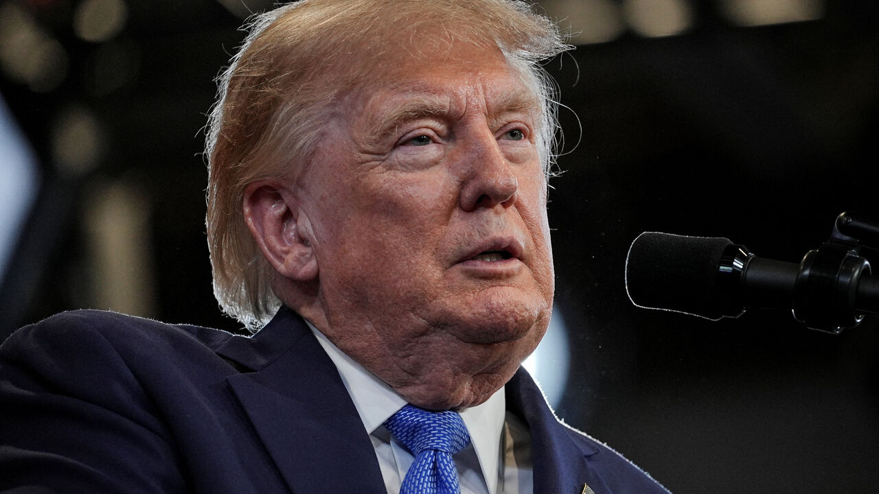 U.S. President Donald Trump delivers remarks at David S. Mack Center for Training and Intelligence in Garden City, New York, U.S., August 14, 2026. REUTERS/Ken Cedeno