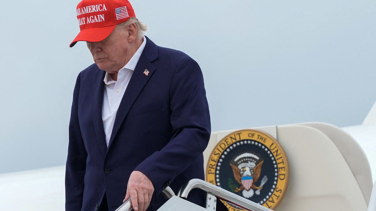 U.S. President Donald Trump disembarks Air Force One at Joint Base Andrews, Maryland, U.S., August 16, 2026. REUTERS/Ken Cedeno